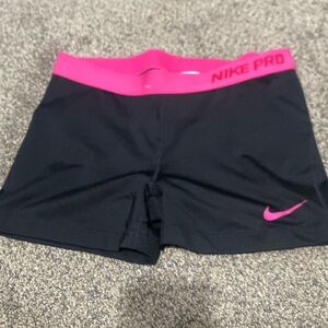 black nike pros w/ pink waistband size xl